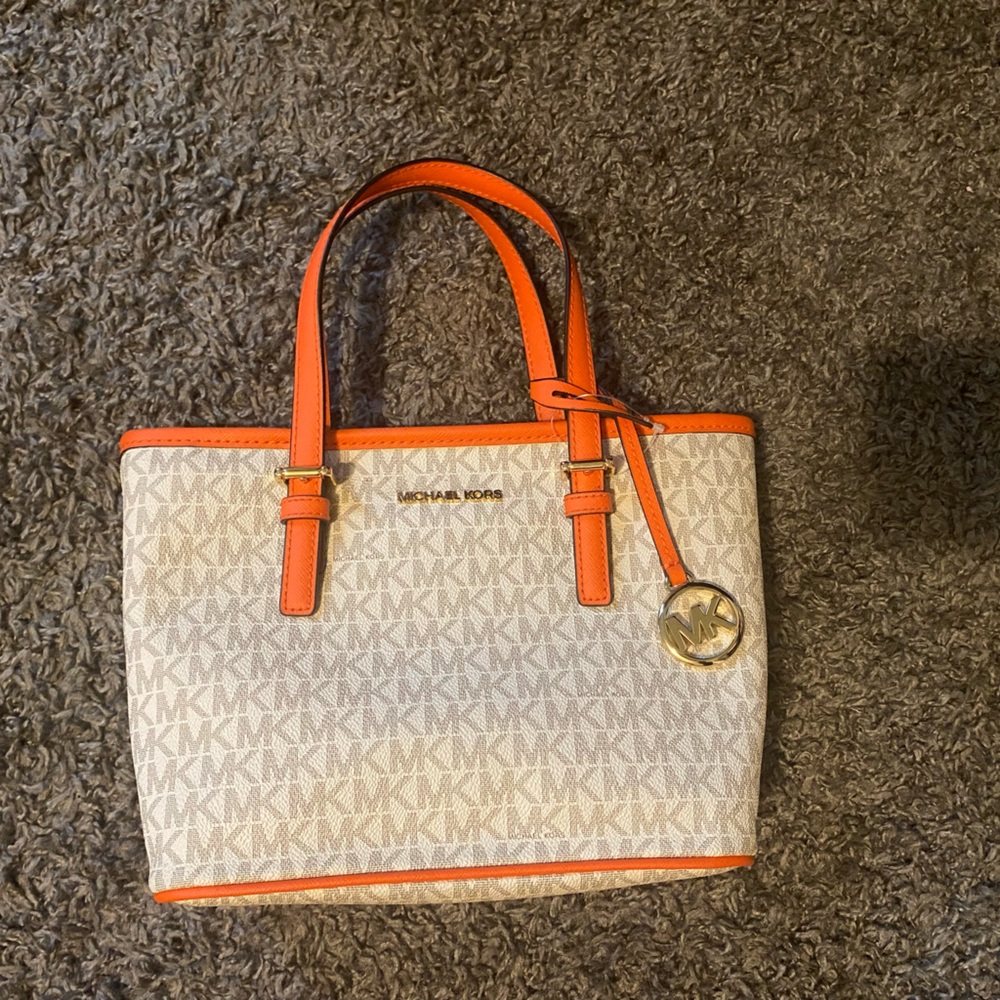 Micheal Kors hand bag with strap